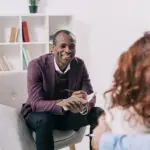 Image of schema therapist at the schema therapy training center practicing empathic confrontation.